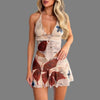 2-piece summer dress set featuring a sexy V-neck halter top and a pleated short skirt in a floral print design.