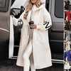 Stylish hooded windbreaker long jacket for women, featuring pockets and knit sleeves, perfect for fall and winter wear.