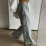 Gray loose casual high waist skateboarding pants for women, featuring a comfortable fit and stylish design.