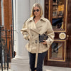 Woman wearing a khaki long-sleeved trench coat with a waist belt and sunglasses.