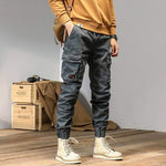American straight multi-pocket trousers for men, featuring a gray solid color and drawstring waist, ideal for daily wear.