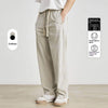 Beige elastic waist pants featuring tapered design, perfect for a casual stylish look in two colors.