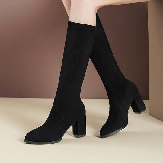 Black suede below the knee stretch boots with chunky heel and pointed toe for women.