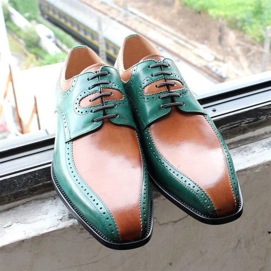 Stylish British fashion carved leather shoes in green and brown color combination, featuring a pointed toe and rubber sole.