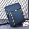 Business casual backpack in navy blue with contrasting orange accents, waterproof nylon, perfect for travel and urban style.