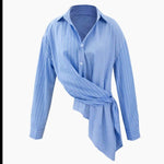 Blue striped long sleeve shirt with irregular strap belt and seamless stitching design.