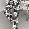 Loose straight trousers for women in a black and white tie-dye pattern, perfect for casual wear.