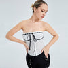 Stylish white camisole top with contrasting color straps, featuring a flower pattern and strapless design.