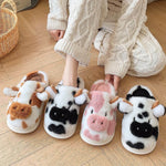 Cute cartoon cow plush slippers in various colors, cozy and non-slip indoor footwear for couples.