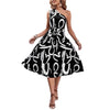 Woman wearing Letter Print Off-Shoulder Pleated Midi Dress with black and white pattern, sleeveless and elegant design.