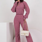 Fashion casual set in striped brown and red, round neck, featuring relaxed fit and stylish handbag.