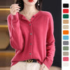 Pink cashmere cardigan sweater for women, featuring button front and long sleeves, available in multiple colors.