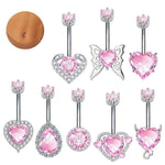 Fashionable pink belly rings featuring hearts, butterflies, and zircon stones for elegant body jewelry.