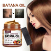 Hair conditioner with Batana oil for revitalizing hair growth and strength, enhancing texture and shine.