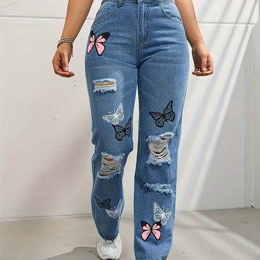 Model wearing Butterfly Print High-Waist Straight-Leg Jeans in cotton denim with butterfly patterns and distressed details.