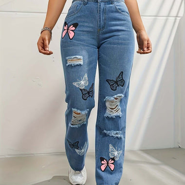 Model wearing Butterfly Print High-Waist Straight-Leg Jeans in cotton denim with butterfly patterns and distressed details.