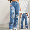 High waisted straight leg jeans for women with butterfly print, ripped details, distressed denim, stylish summer pants.