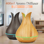 400ml aroma diffuser in wood grain design with 7 LED color options for enhancing home ambiance and aromatherapy.