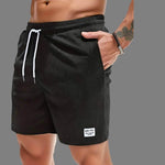 Men's black corduroy drawstring shorts with stylish design and comfortable fit for summer sports.