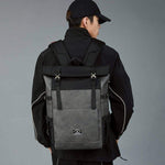 Large capacity roll-up backpack in gray, unisex design, suitable for daily use and waterproof.