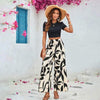 Leaf printed casual cropped t-shirt blouse and wide leg pants outfit for women, perfect for summer styling.