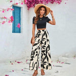 Leaf printed casual cropped t-shirt blouse and wide leg pants outfit for women, perfect for summer styling.