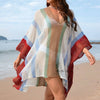 Loose plus size bikini blouse with colorful striped pattern, perfect for beachwear and summer outings.