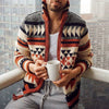 Man wearing a stylish zippered cardigan jacket, holding a coffee mug, with a cityscape backdrop.