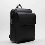 Men's black PU backpack for travel and commuting, waterproof with spacious 20-35L capacity, stylish and functional.