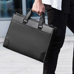 Man carrying a sleek black business briefcase made from durable Oxford cloth, ideal for professional settings.