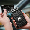 Men's metal card bag wallet in carbon fiber black, holding credit card, showcasing sleek design and genuine leather material.