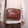 Men's real leather cowhide shoulder bag in brown, perfect for casual daily use.