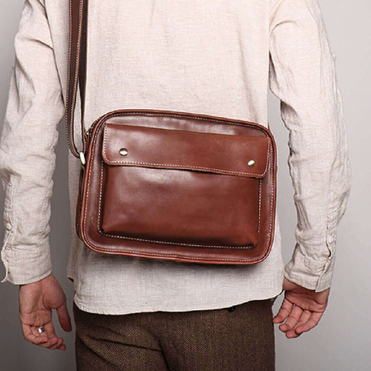 Men's real leather cowhide shoulder bag in brown, perfect for casual daily use.