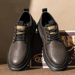 Men's summer breathable casual leather shoes in brown with round toe and low heel design.