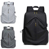 Men's waterproof backpack in grey and black, features breathable design, PU leather, and ergonomic air pillow belt.