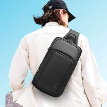 Men's waterproof leisure shoulder chest bag in black, ideal for urban simplicity and daily use.