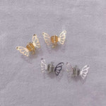 Metal butterfly hair clips in gold and silver, perfect for styling side bangs and managing broken hair.