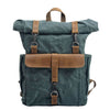 Casual outdoor mountaineering backpack in lake green and brown with clamshell design and multiple pockets.