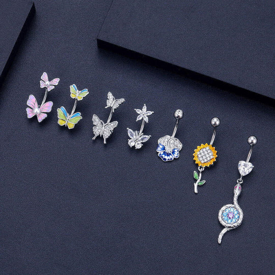 Colorful butterfly and flower design navel studs in silver, perfect for stylish body piercing jewelry.