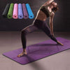 Non-slip TPE yoga mat with position lines, perfect for beginners; available in various colors, 6mm thick for comfort.