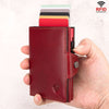 Red oil wax cowhide coin purse with automatic card dispensing feature and RFID protection.
