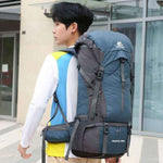 Outdoor sports hiking bag with 70 liters capacity, designed for comfort and durability, worn by a user outdoors.