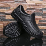 Outdoor travel four seasons male plus size rubber leather shoes in black with low top design.