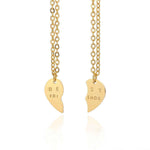 Gold plated best friend necklace with two petal pendants, featuring 'BEST' and 'FRIENDS' engravings.