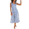 Woman wearing a Floral Sleeveless A-Line Swing Dress, blue and white print, round-neck, ideal beach summer outfit.