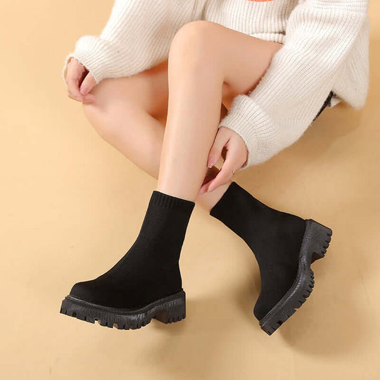 Black round toe large size Martin boots for women with low heel and comfortable fit, suitable for warmth and style.