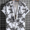 Short-sleeved Hawaiian shirt with palm tree design, perfect for beach outings and casual wear.