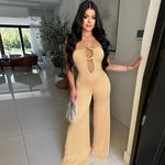 Sleeveless hollow metal decorative jumpsuit in apricot color, featuring a sexy style and straight-leg pants.