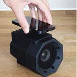 Smart Magnetic Induction Resonance Speaker with a smartphone being placed on top for audio playback.