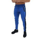 Sports casual multicolor skinny pants in blue and black, close-fitting and stretchy, perfect for athletic wear.